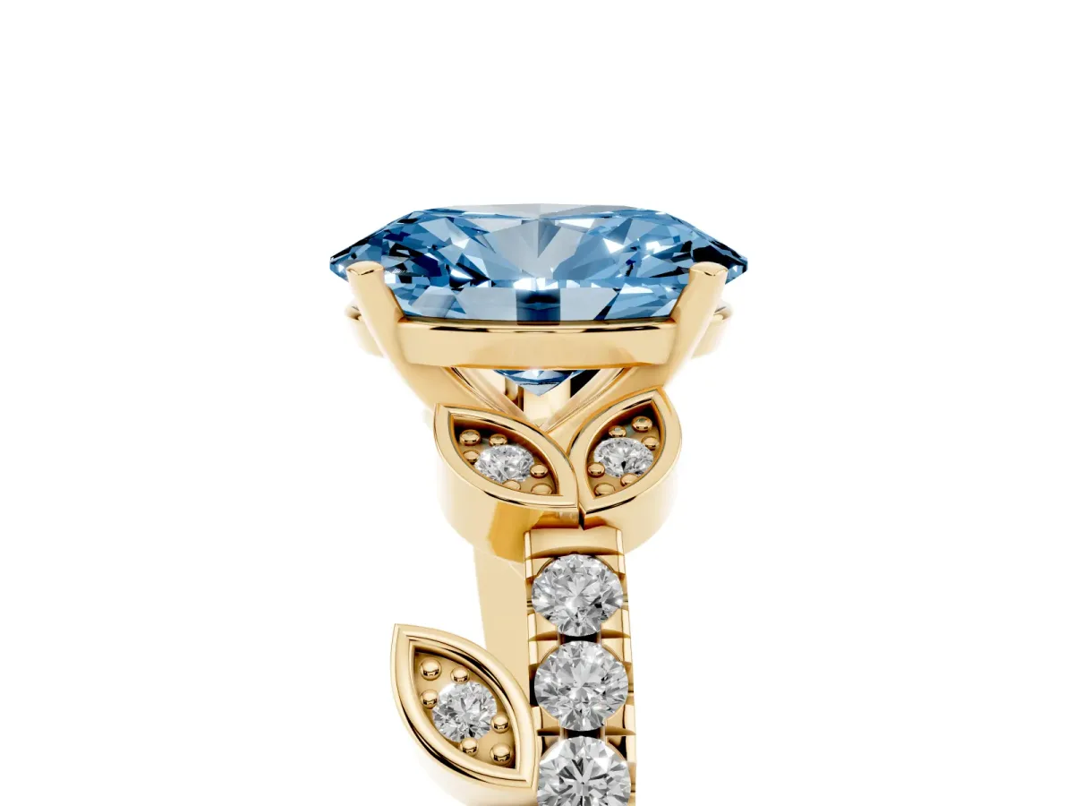Fancy Blue Oval Cut Solitaire Leaf-Inspired Diamond Ring with Pavé Band and Four-Prong Setting Yellow gold