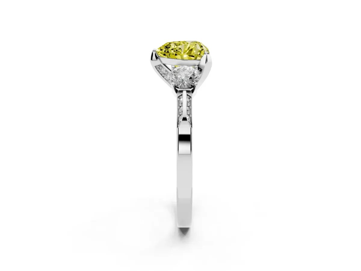 Fancy Yellow Heart Cut Brilliant Three-Stone Diamond Ring with Pavé Band and Four-Prong Setting Silver
