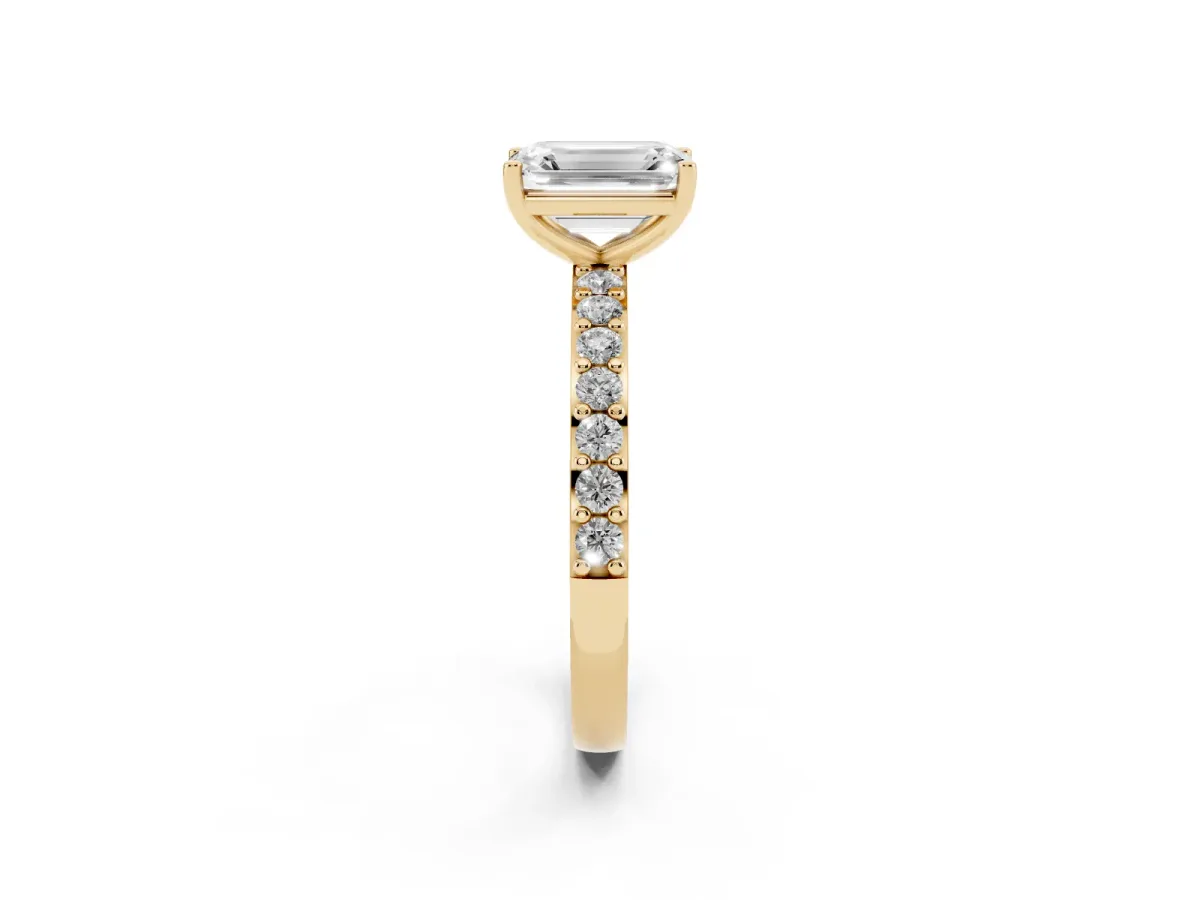 Emerald Cut Cut Diamond Solitaire with Pave Band and Four-Prong Setting Yellow gold