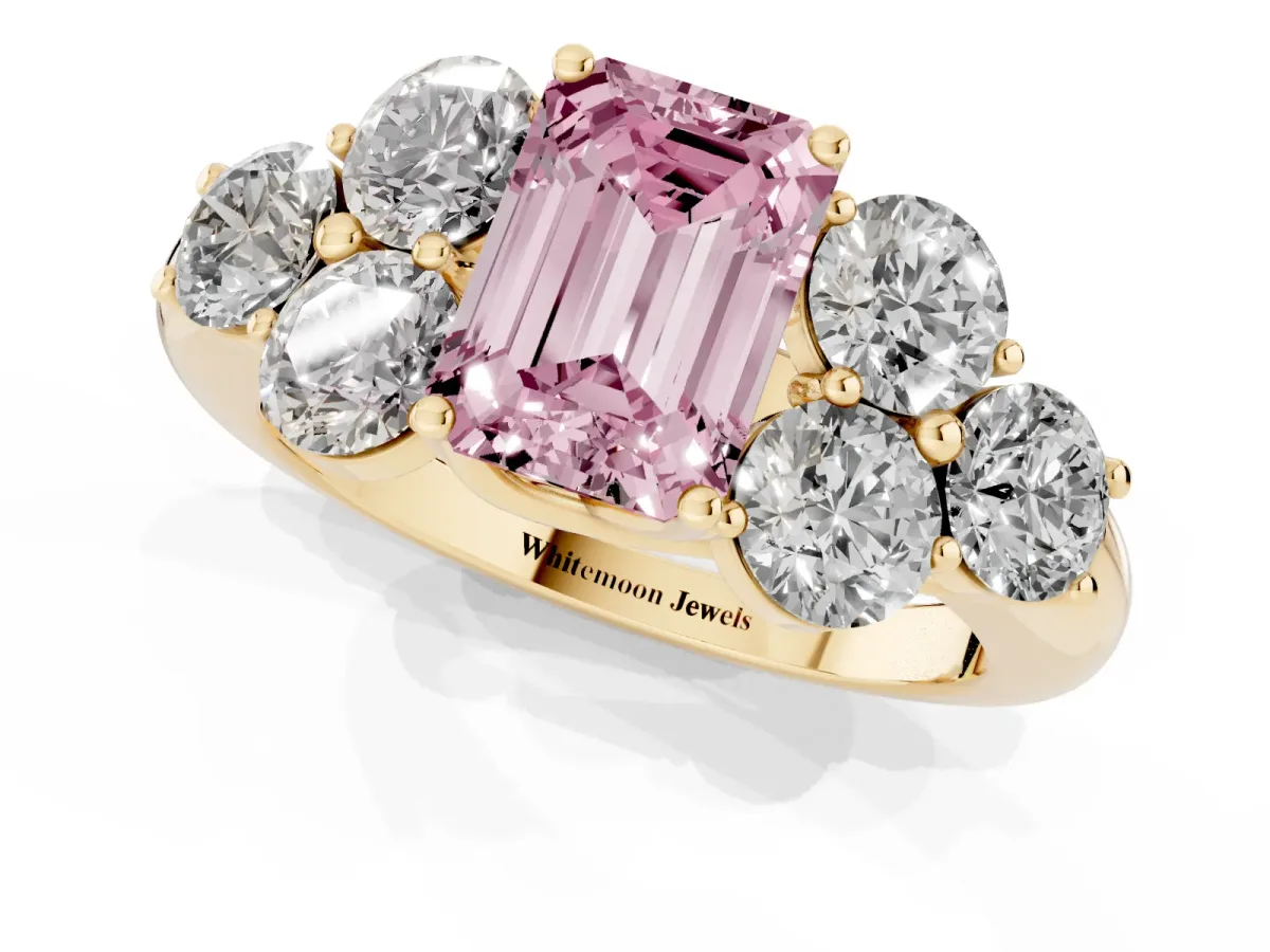 Fancy Pink Emerald Cut Cut Diamond Cluster Ring with Round Accent Stones and Prong Setting on a Classic Band Yellow gold