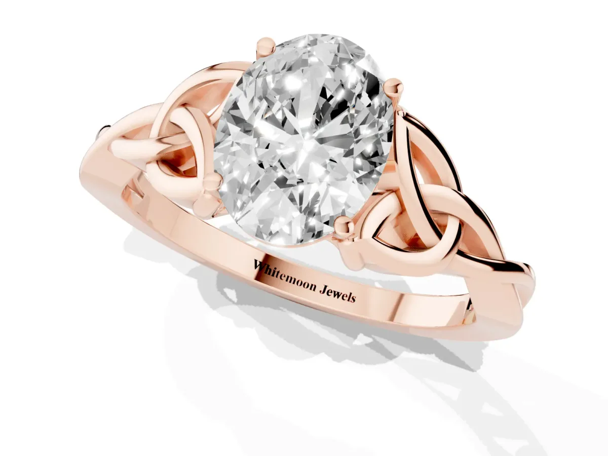 Oval Cut Diamond Solitaire Engagement Ring with Celtic Knot Band and Four-Prong Setting Rose gold