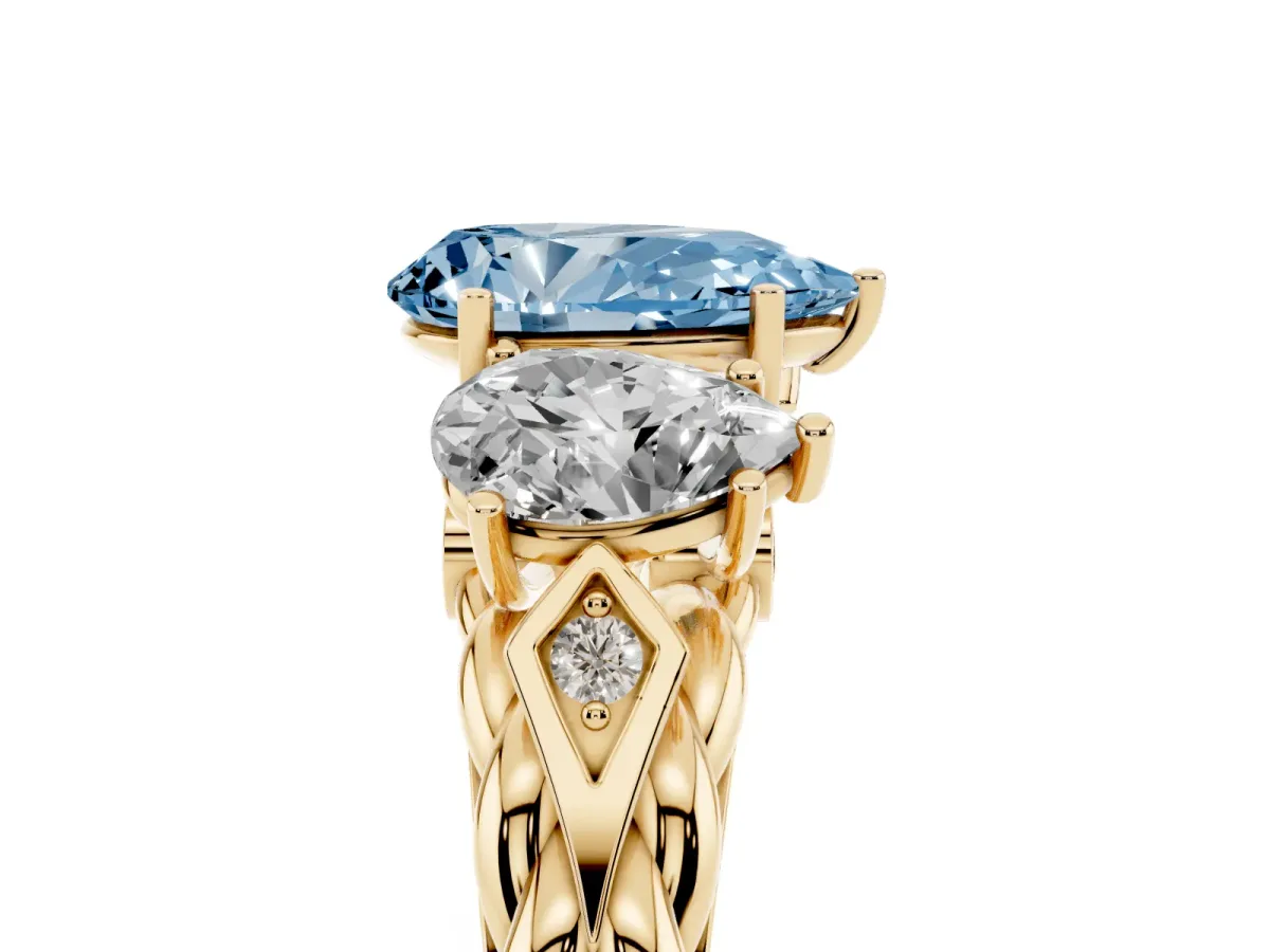 Fancy Blue Three-Stone Pear Cut Diamond Braided Band Ring with Four-Prong Setting Yellow gold