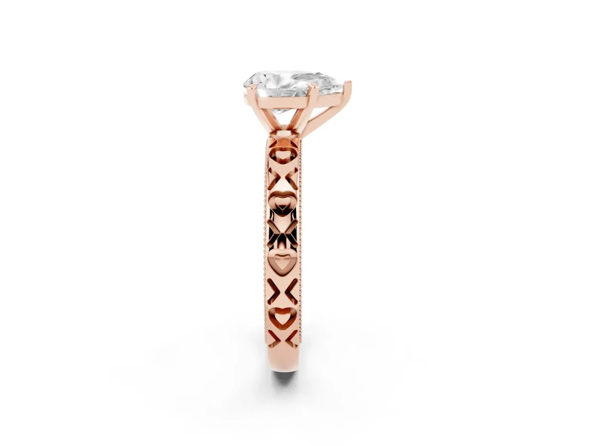 Pear Cut Solitaire Diamond Engagement Ring with XO Engraved Band and Four-Prong Setting Rose gold