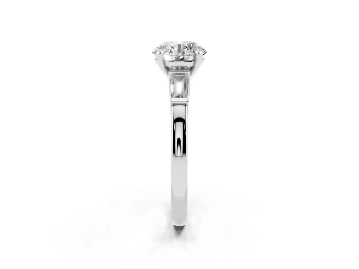 Round Cut Cut Diamond Solitaire Ring with Tapered Baguette Accents and Four-Prong Setting White gold