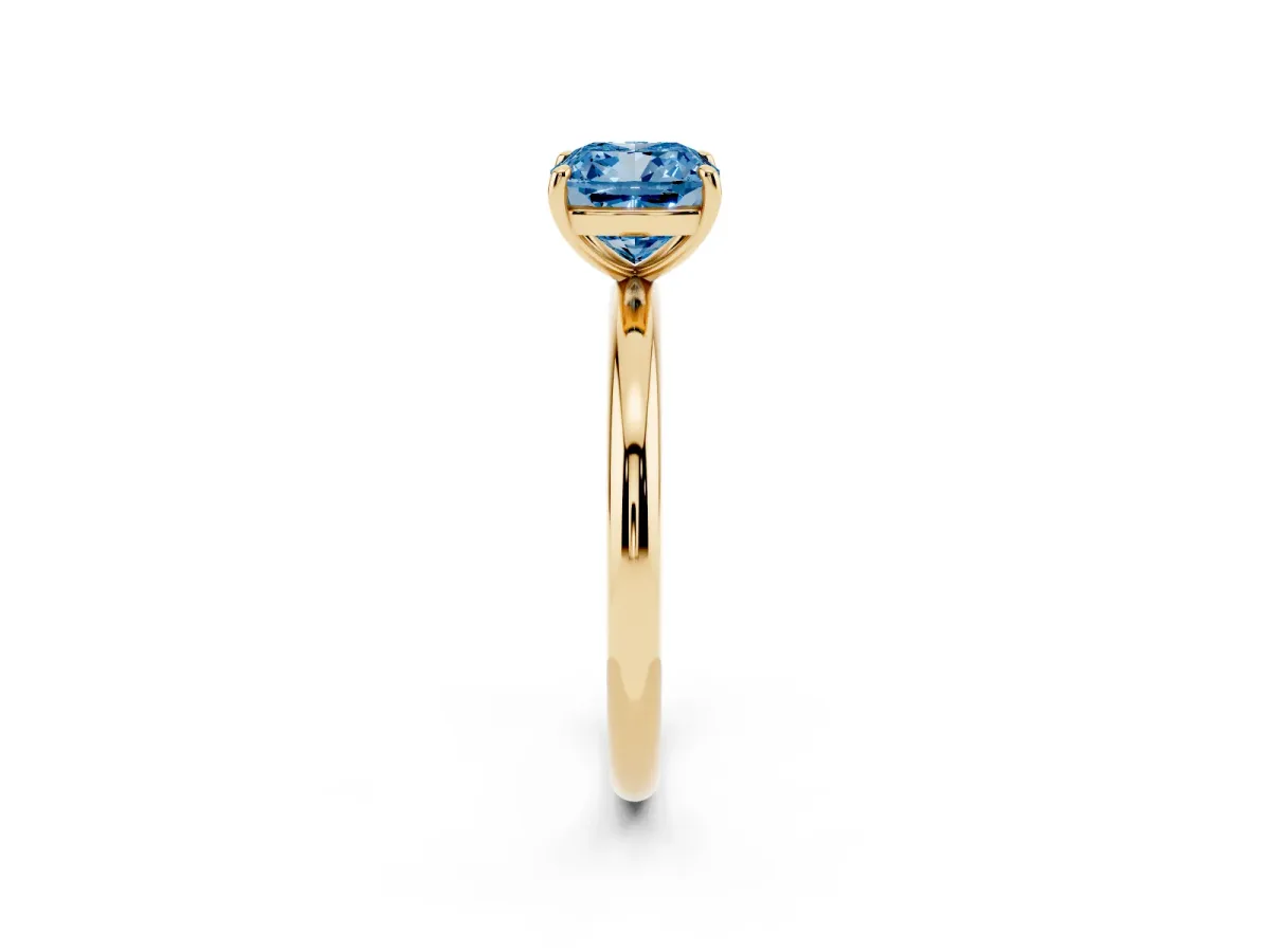 Fancy Blue Cushion Cut Solitaire Diamond Ring with Four-Prong Setting on a Plain Band Yellow gold