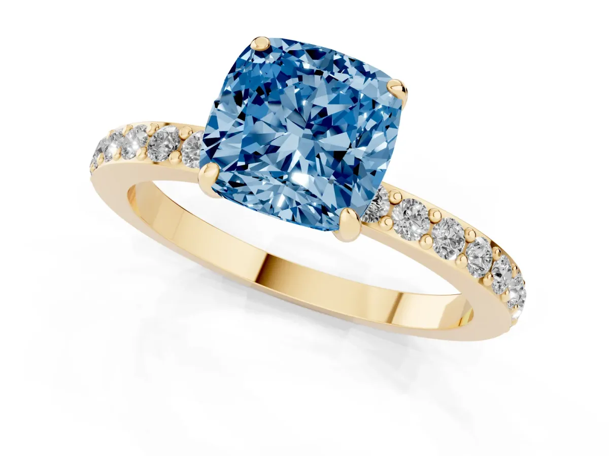 Fancy Blue Cushion Cut Diamond Solitaire Engagement Ring with Pavé Band and Four-Prong Setting Yellow gold