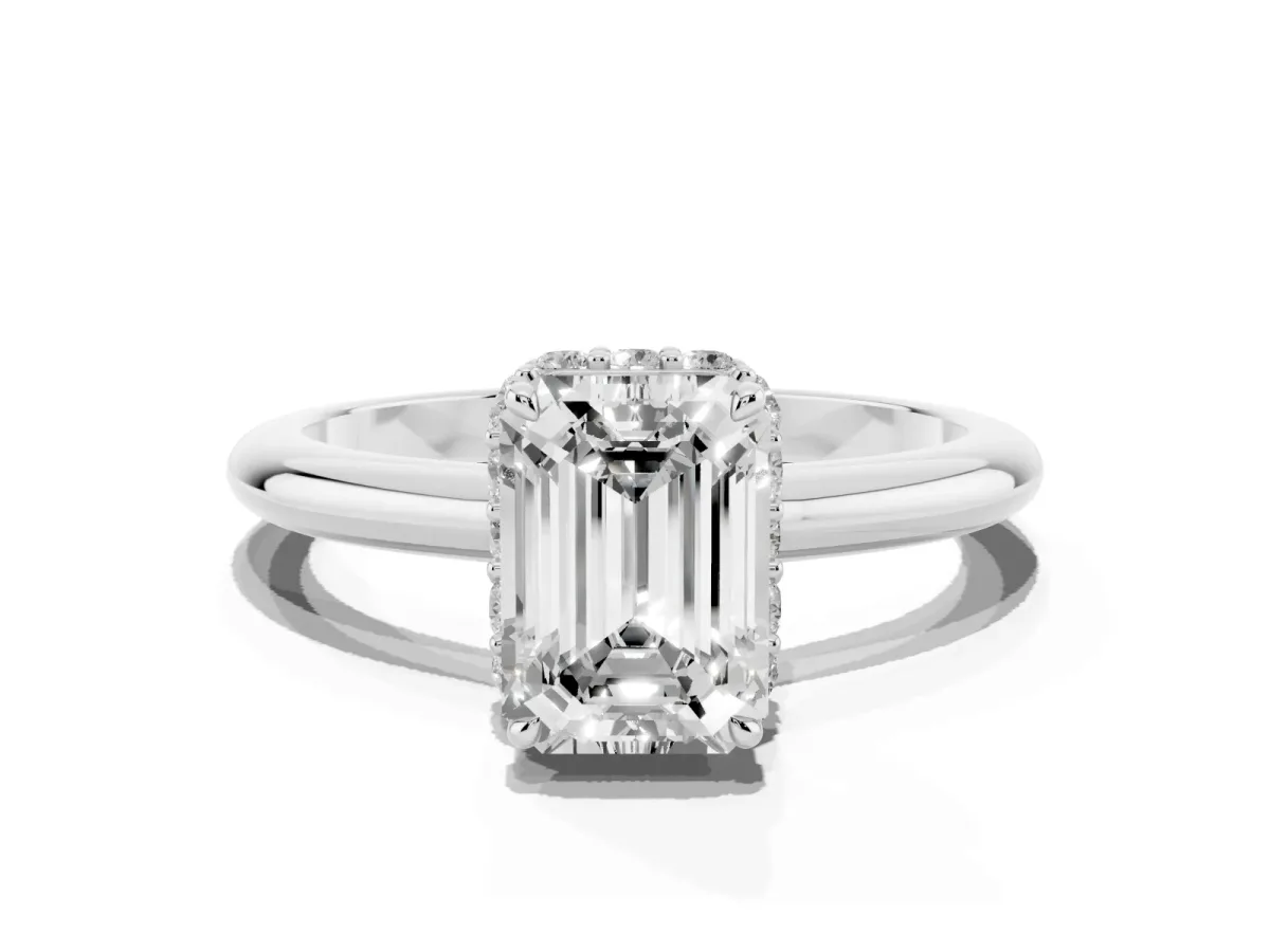 Emerald Cut Brilliant Solitaire Engagement Ring with Six-Prong Setting and Classic Band Platinum