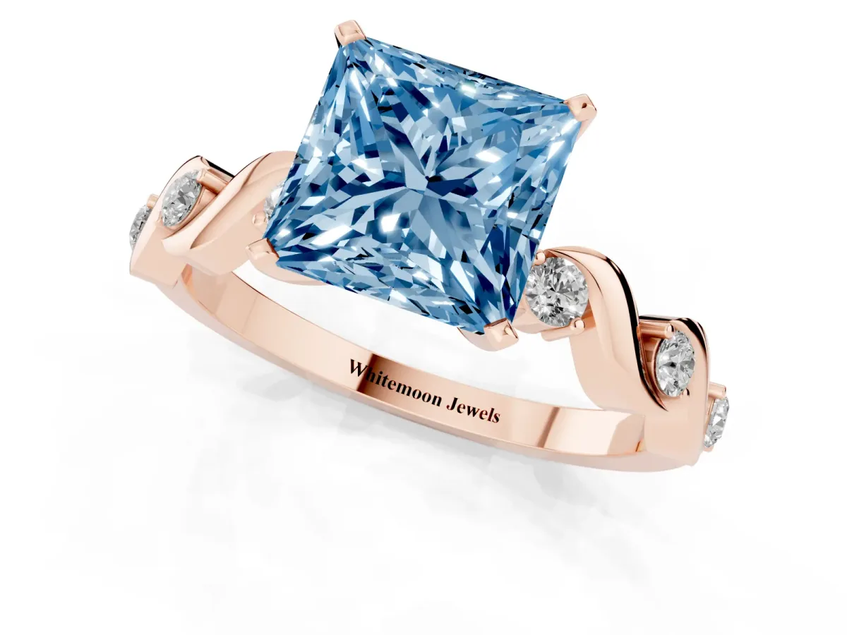 Fancy Blue Princess Cut Diamond Solitaire Twisted Band with Round Accents and Prong Setting Rose gold