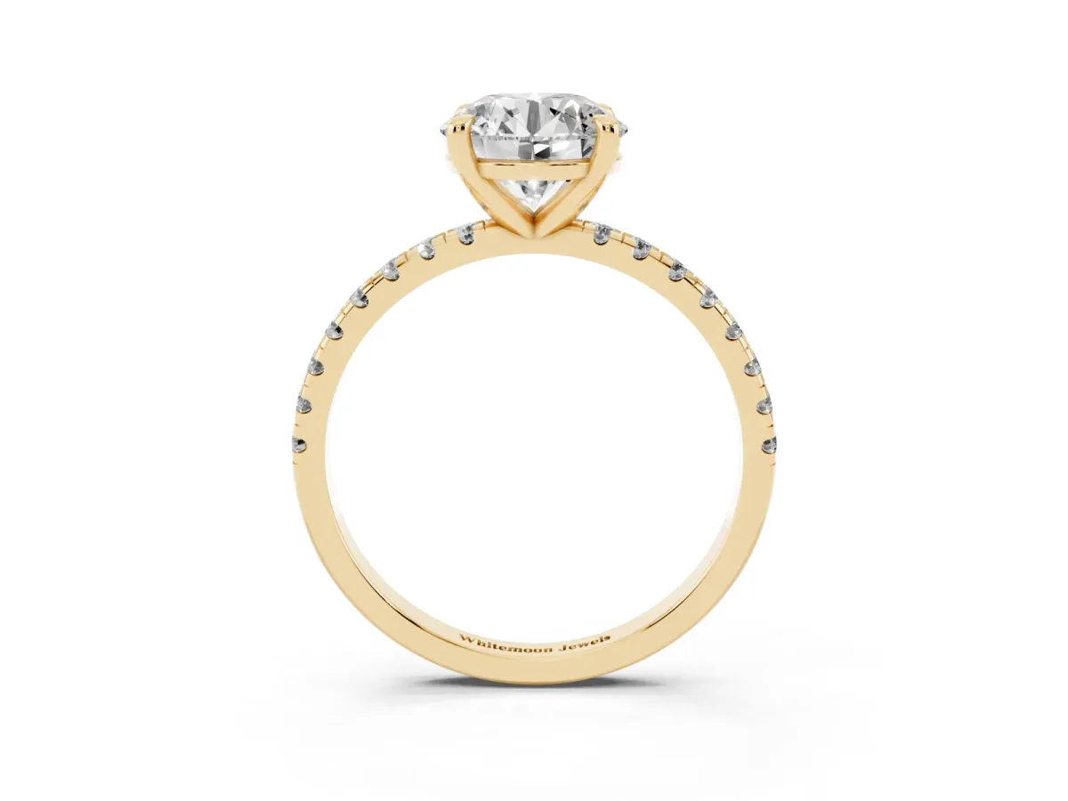 Round Cut Diamond Brilliant Solitaire Ring with Pavé Band and Four-Prong Setting Yellow gold