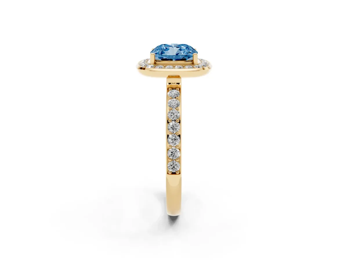 Fancy Blue Cushion Cut Diamond Halo Ring with Bezel Frame and Pavé Band Yellow gold
