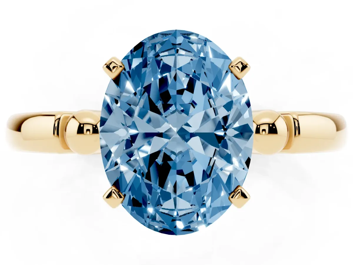 Fancy Blue Oval Cut Solitaire Beaded Band with Four-Prong Setting Yellow gold