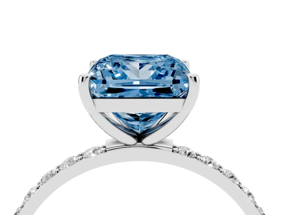 Fancy Blue Princess Cut Diamond Solitaire Ring with Round Pavé Shoulders and Prong Setting Silver