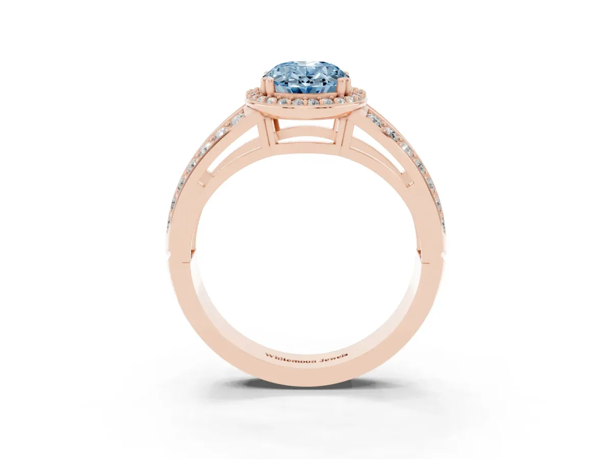Fancy Blue Oval Cut Diamond Halo Ring with Split Shank Pavé Band and Four-Prong Setting Rose gold