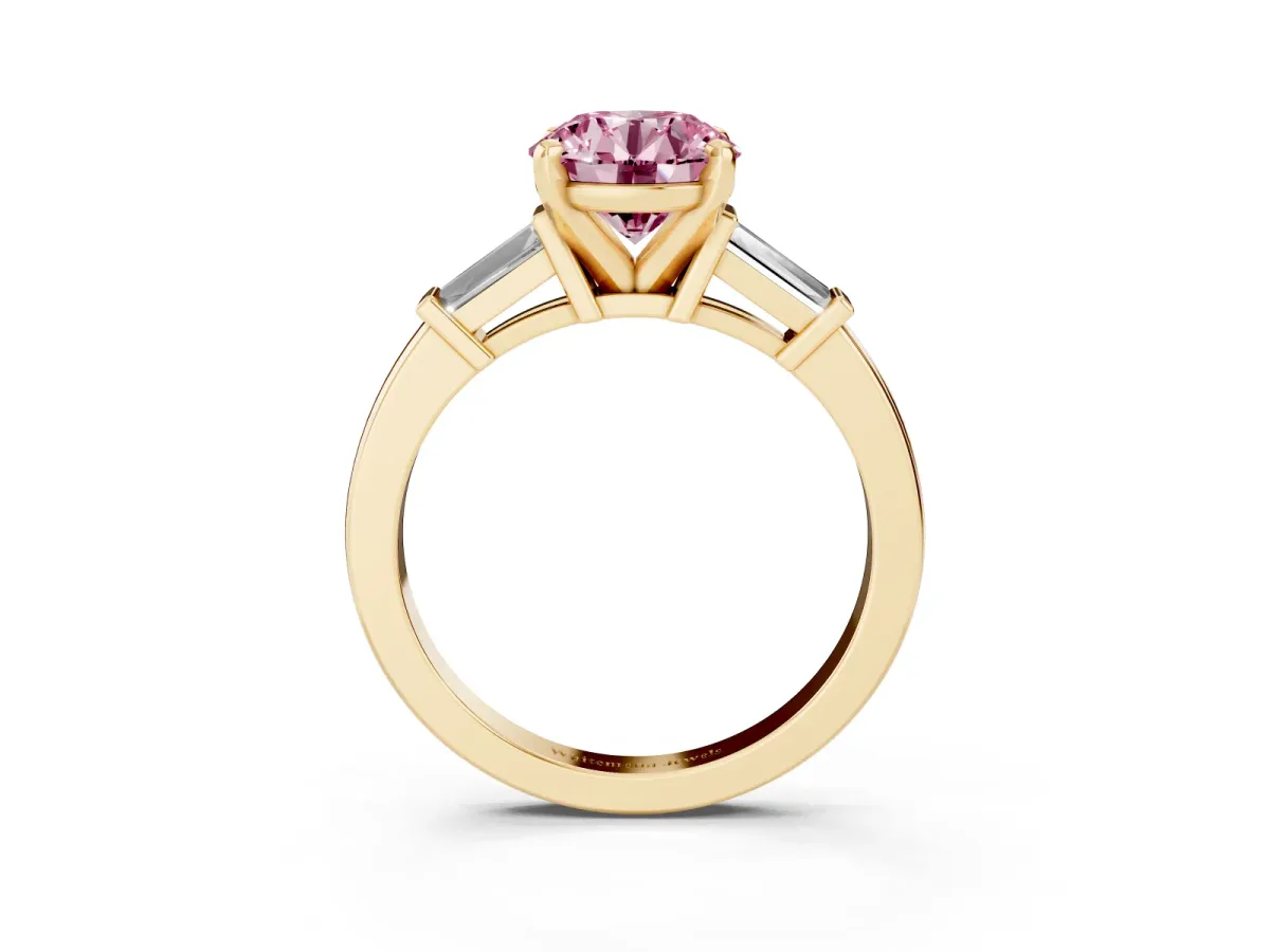 Fancy Pink Round Cut Cut Diamond Solitaire Ring with Tapered Baguette Accents and Four-Prong Setting Yellow gold