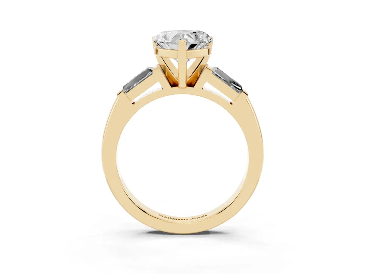Heart Cut Solitaire with Tapered Baguette Side Stones on a Classic Band with Four-Prong Setting Yellow gold