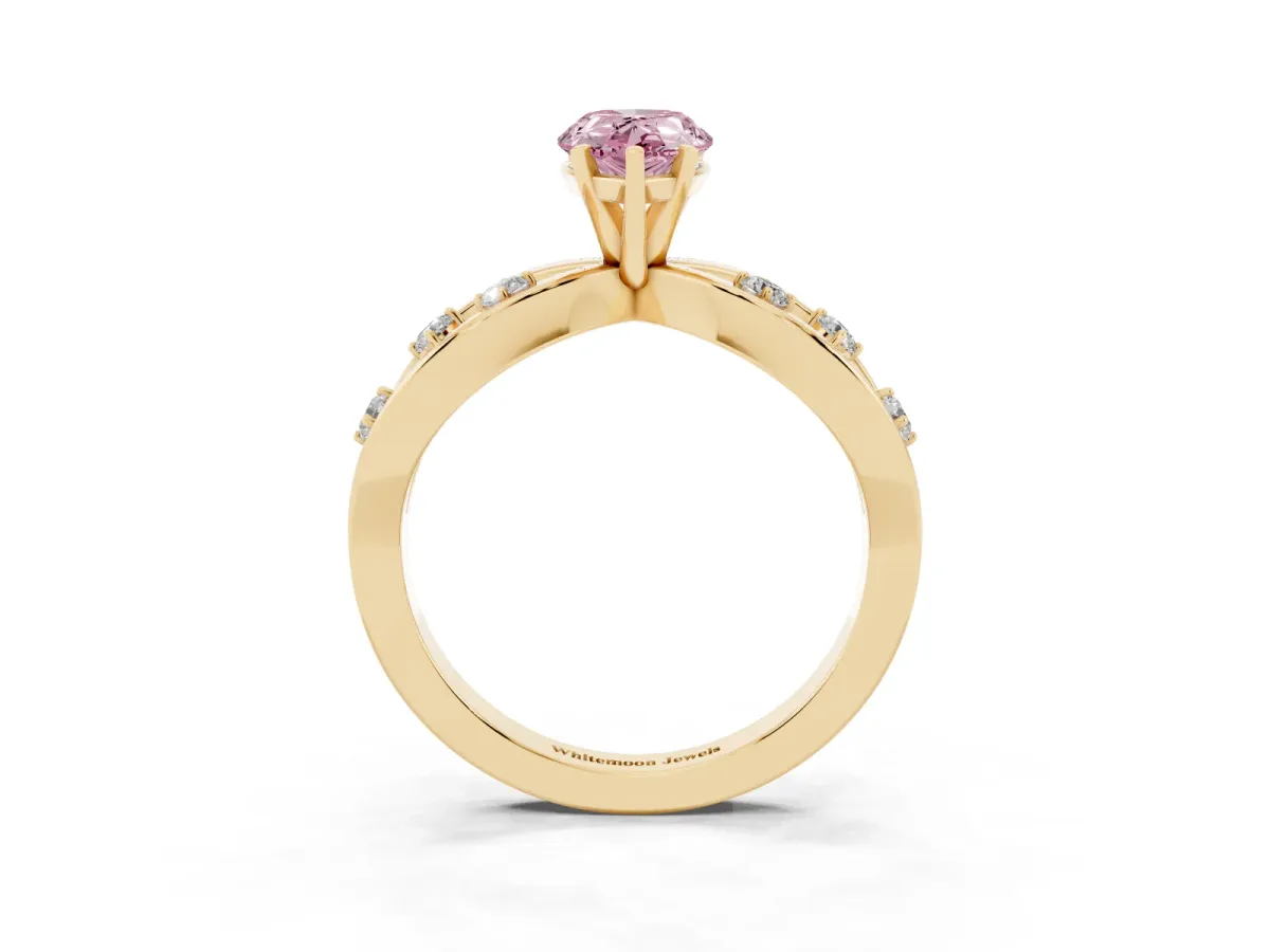 Fancy Pink Pear Cut Cut Solitaire Diamond with Side Stones on Criss-Cross Band and Four-Prong Setting Yellow gold