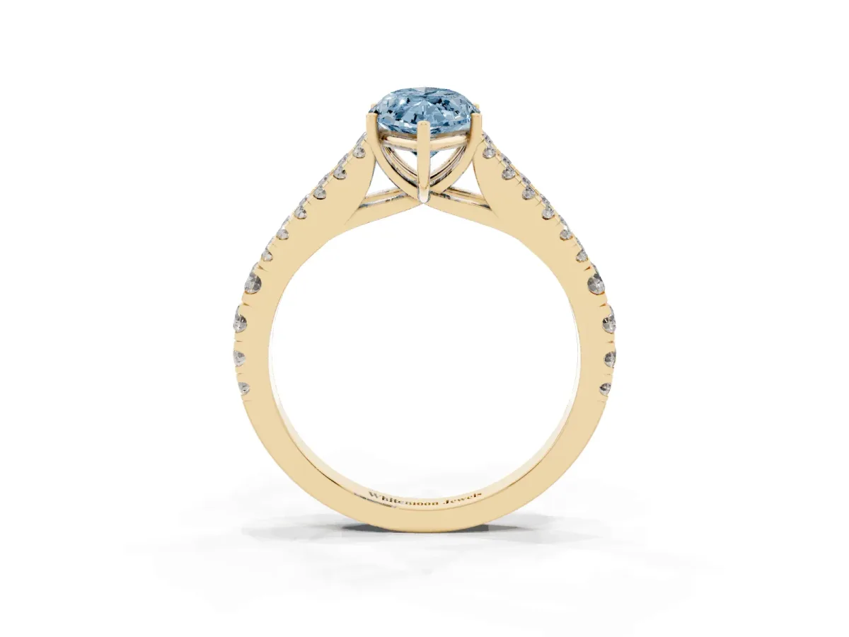 Fancy Blue Marquise Cut Diamond Split Shank Engagement Ring with Round Pavé and Prong Setting Yellow gold