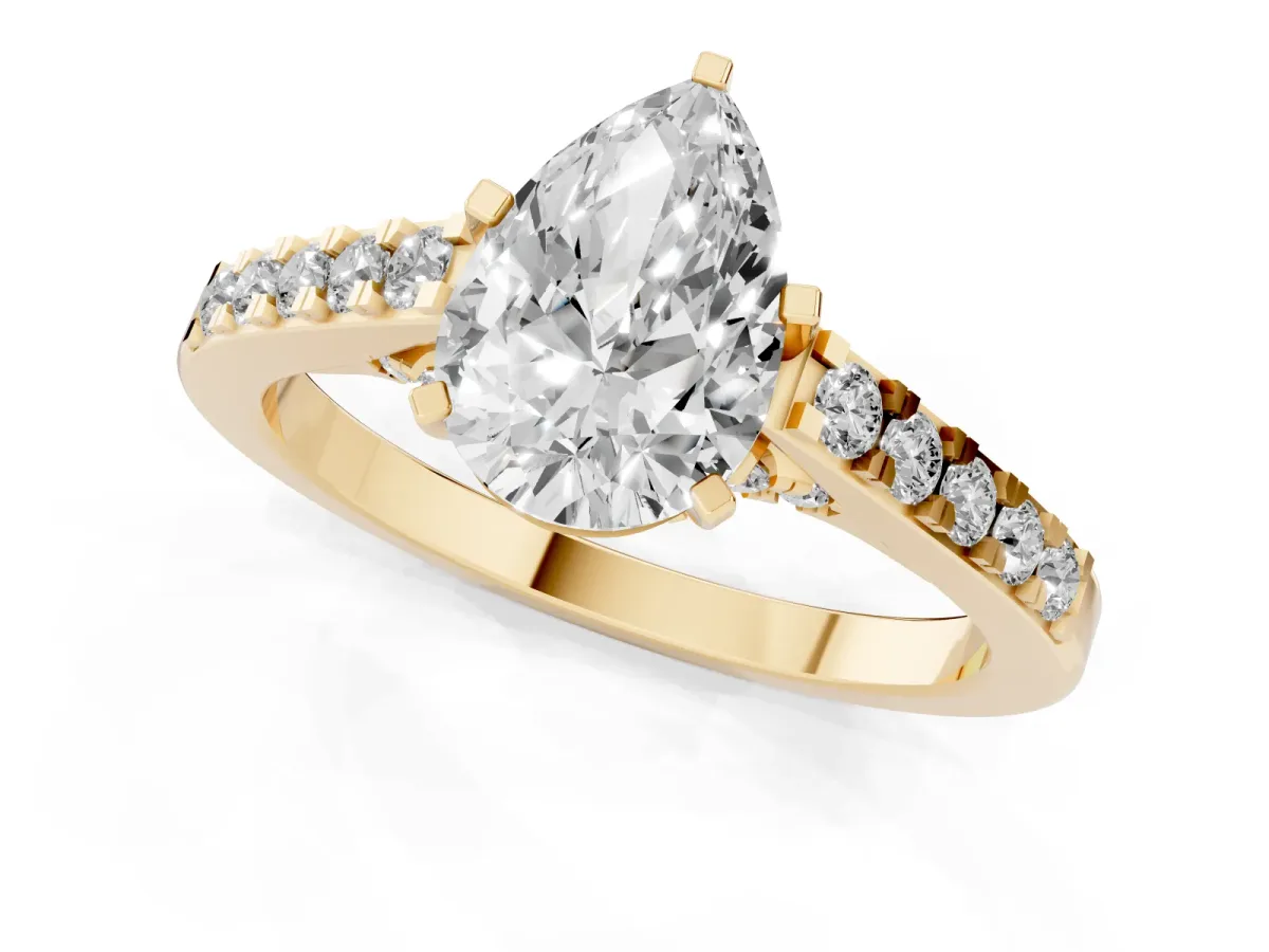 Pear Cut Diamond Solitaire Ring with Crossover Gallery and Round Pavé Band Yellow gold