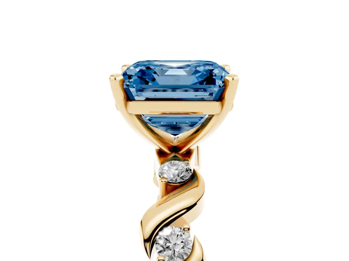Fancy Blue Asscher Cut Diamond Solitaire Twisted Band with Round Accents and Prong Setting Yellow gold