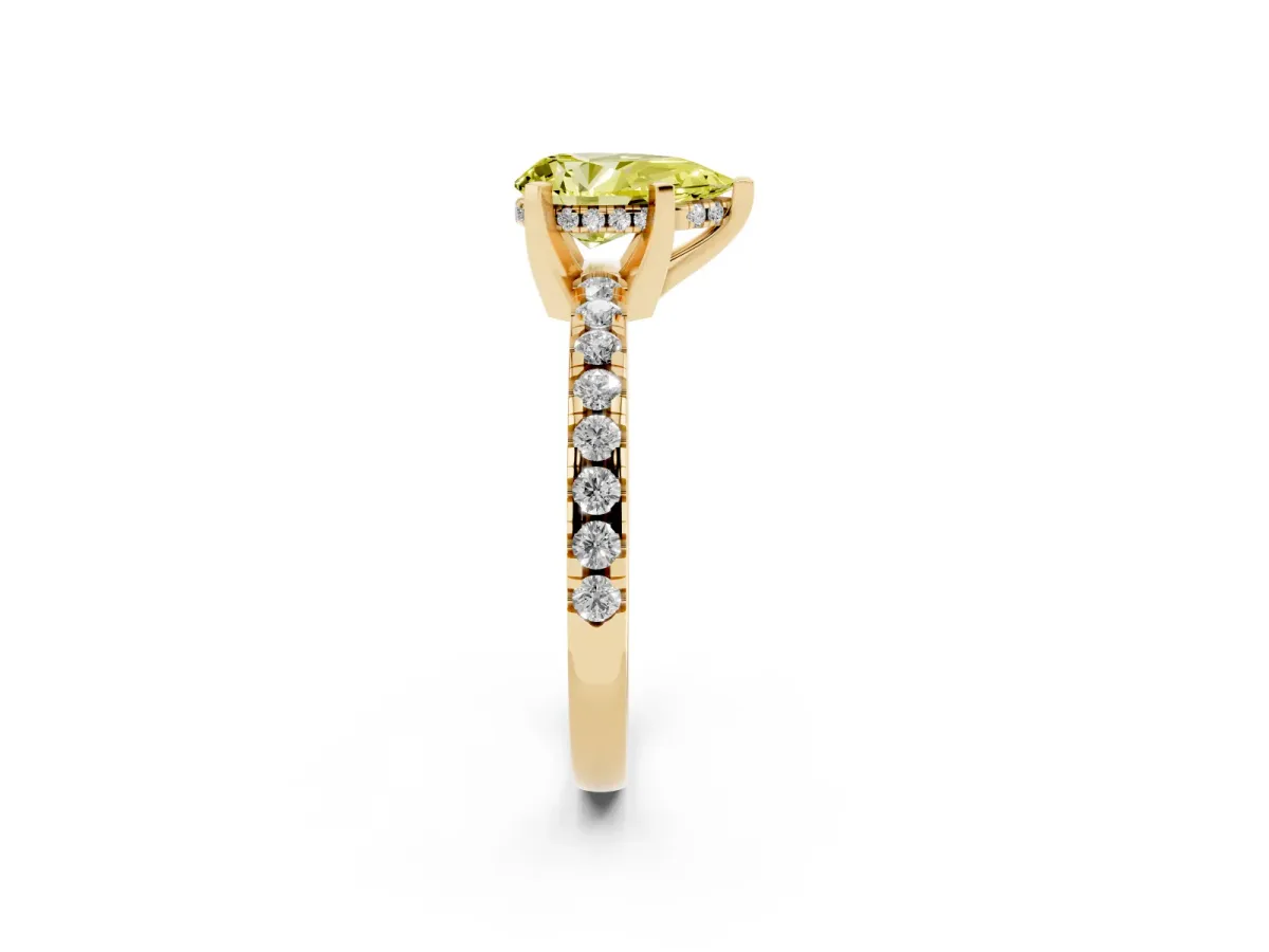 Fancy Yellow Pear Cut Diamond Solitaire Ring with Round Pavé Band and Four-Prong Setting Yellow gold