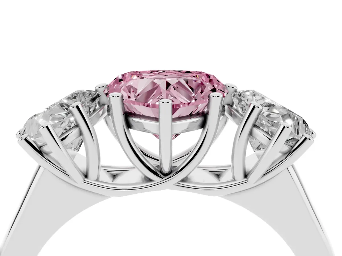 Fancy Pink Heart Cut Three-Stone Diamond Ring with Prong Setting on a Classic Band Silver