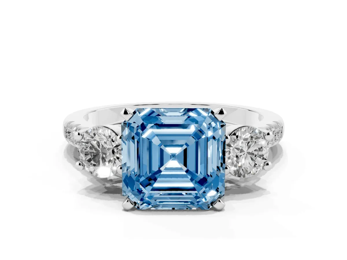 Fancy Blue Three-Stone Asscher Cut Diamond Pavé Band with Four-Prong Setting Platinum