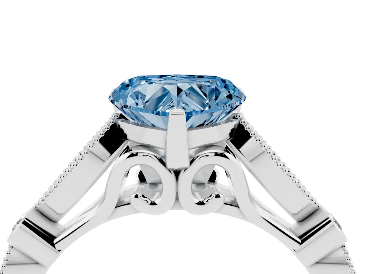 Fancy Blue Heart Cut Cut Diamond with Milgrain Marquise and Bezel Accents on a Solitaire Band with Prong Setting Platinum