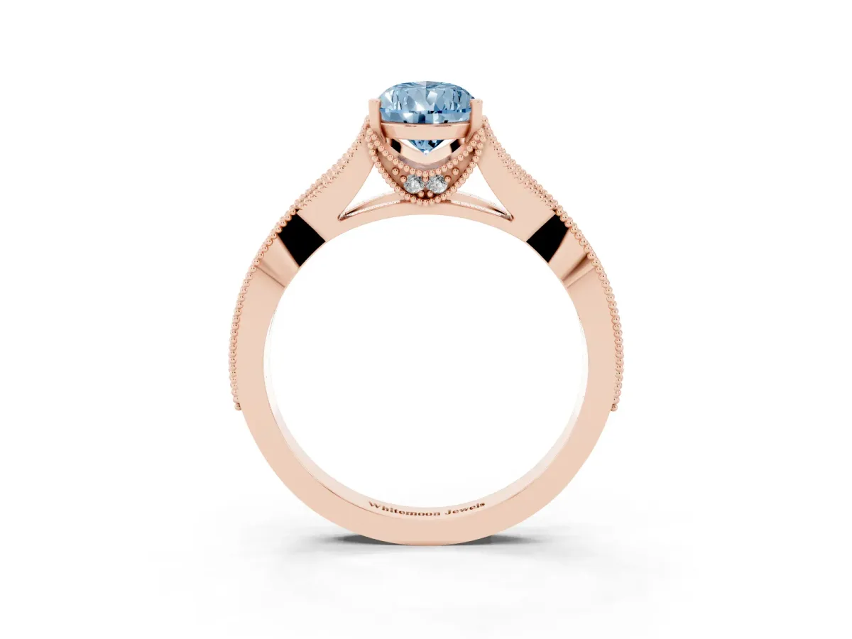 Fancy Blue Pear Cut Cut Diamond Twisted Band with Milgrain Pave Setting and Four-Prong Setting Rose gold