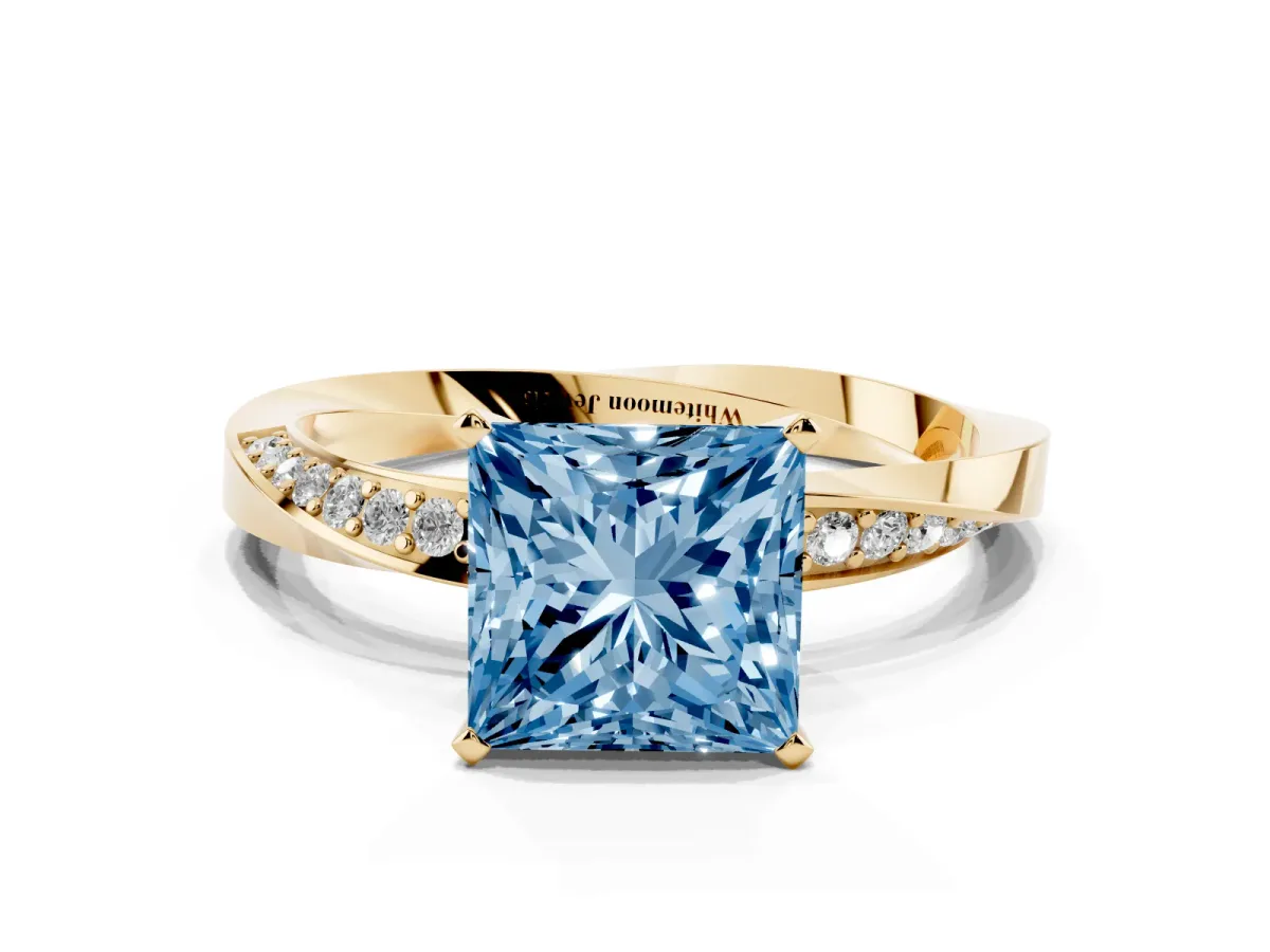 Fancy Blue Princess Cut Diamond Engagement Ring with Side Stone Accents and Four-Prong Setting Yellow gold