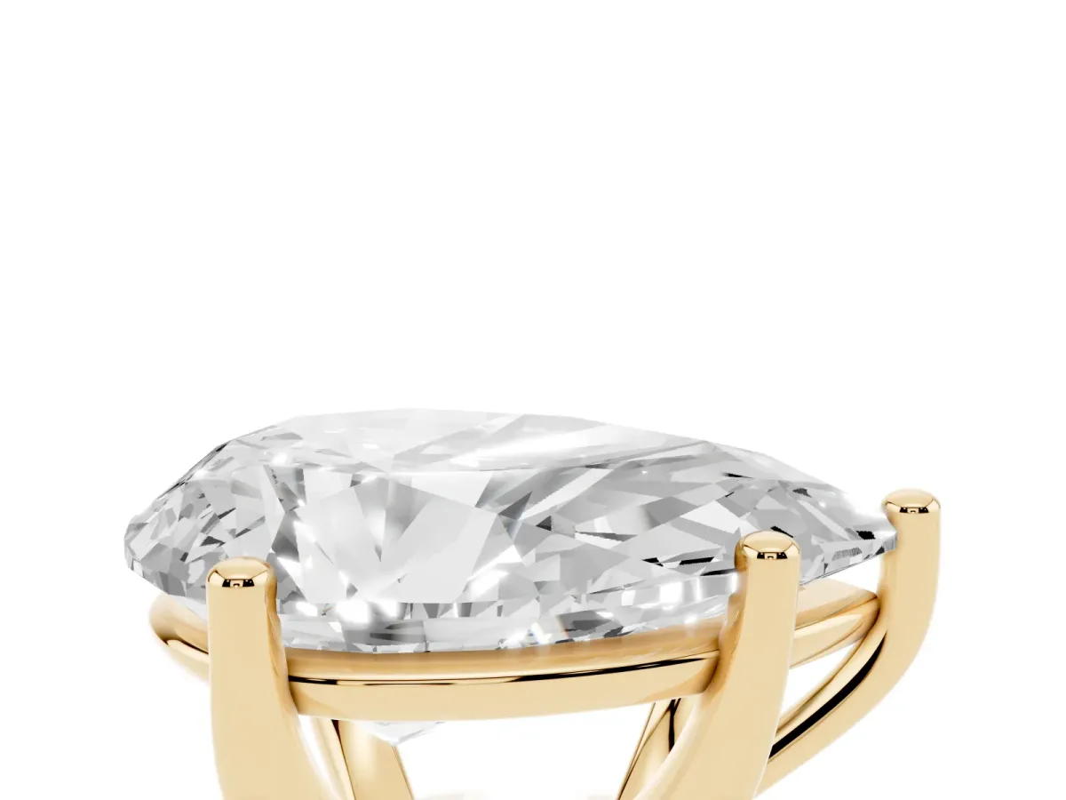 Pear Cut Cut Diamond Solitaire Engagement Ring with Tapered Plain Band and Four-Prong Setting Yellow gold