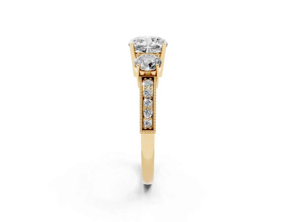 Cushion Cut Three-Stone Diamond Ring with Pavé Band and Four-Prong Setting Yellow gold