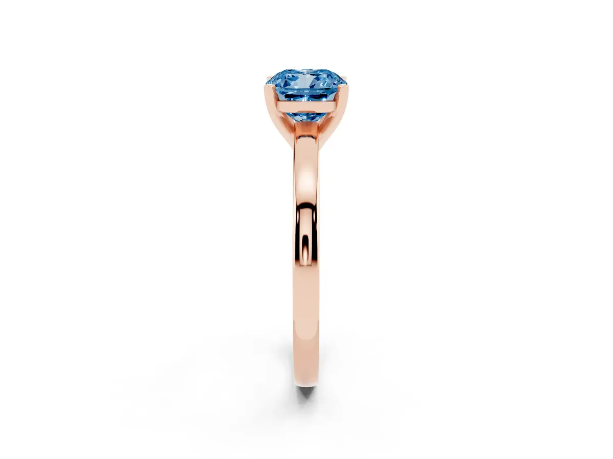 Fancy Blue Cushion Cut Solitaire Diamond Engagement Ring with Four-Prong Setting on a Classic Band Rose gold