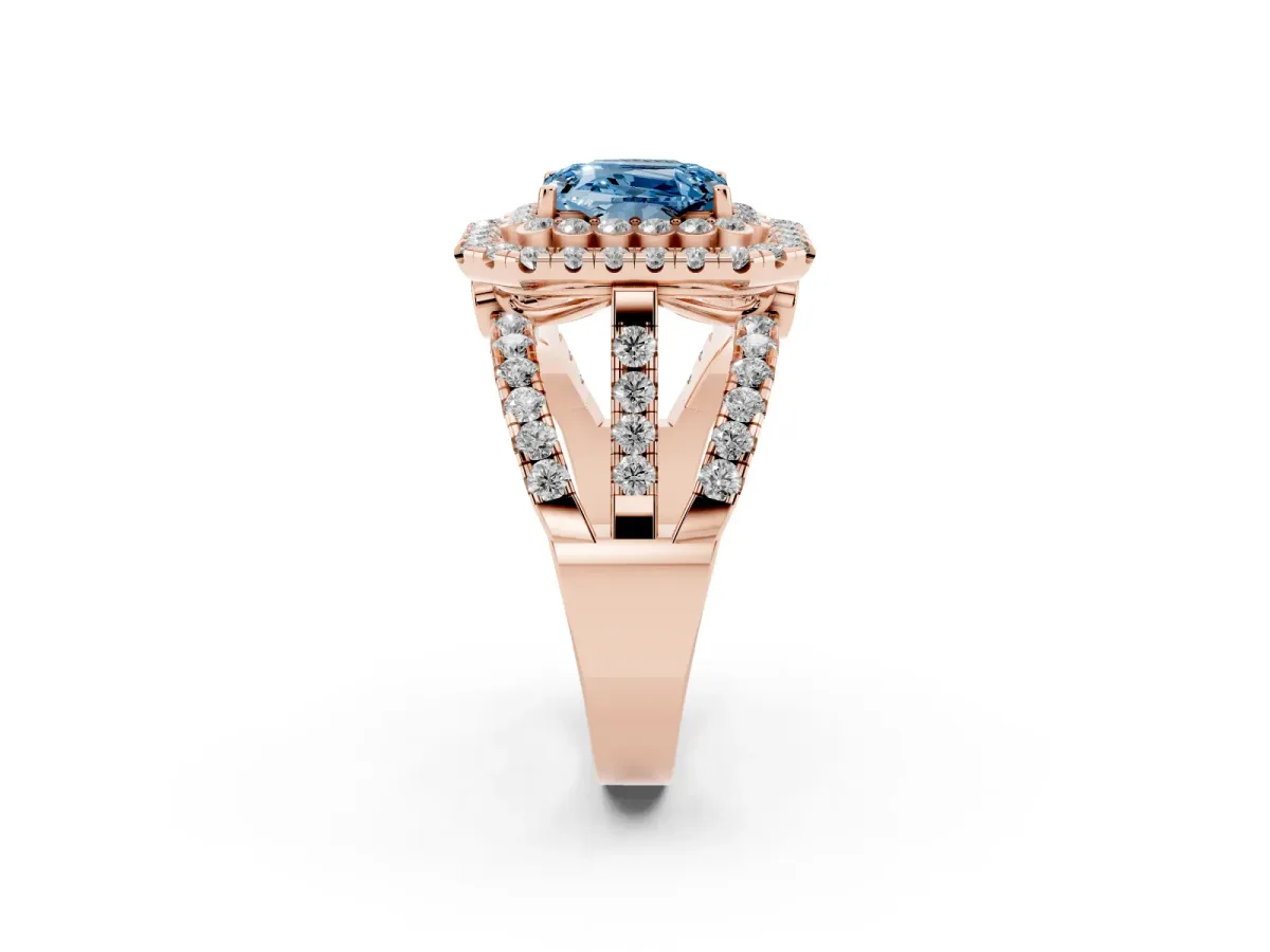 Fancy Blue Emerald Cut Diamond Double Halo Ring with Round Pavé Split Shank and Prong Setting Rose gold