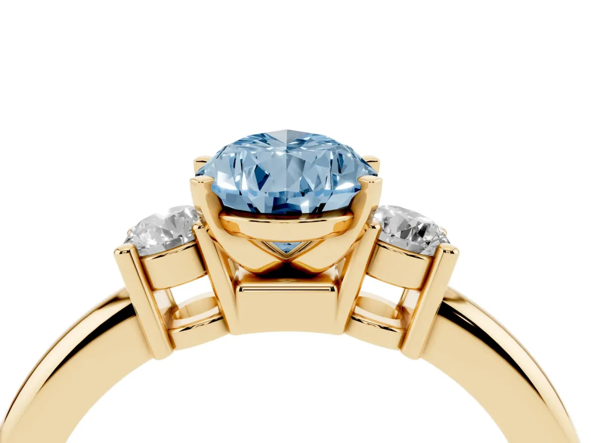 Fancy Blue Three-Stone Pear Cut Cut Diamond Solitaire with Prong Setting and Classic Band Yellow gold