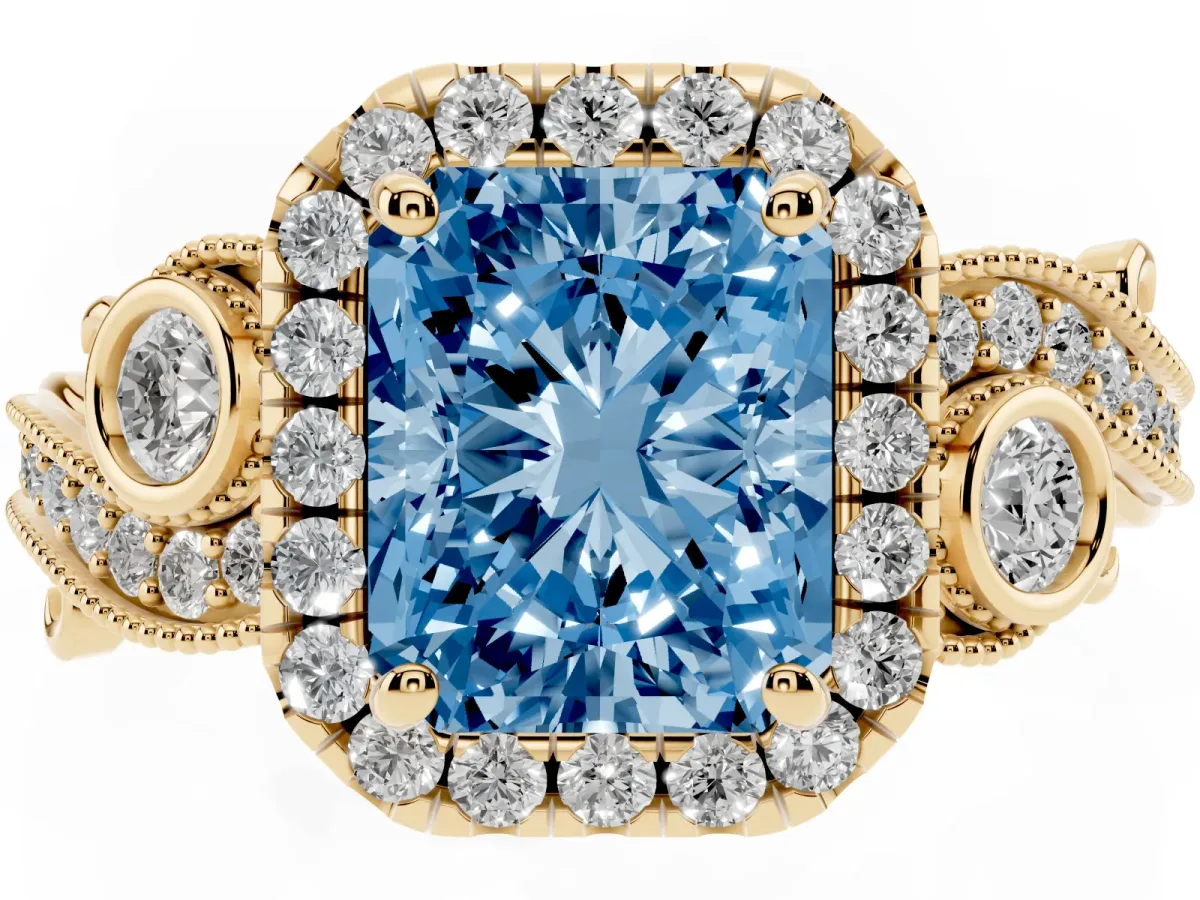 Fancy Blue Radiant Cut Halo Diamond Ring with Milgrain and Bezel Accents on a Split Shank Band Yellow gold