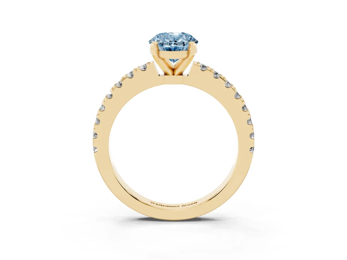 Fancy Blue Oval Cut Solitaire Diamond with Pavé Band and Four-Prong Setting Yellow gold