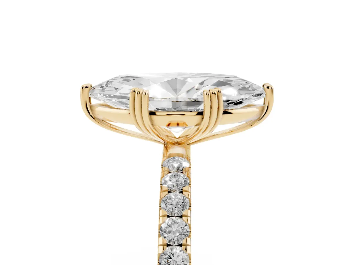 Marquise Cut Brilliant Solitaire with Pavé Band and Claw Prong Setting Yellow gold