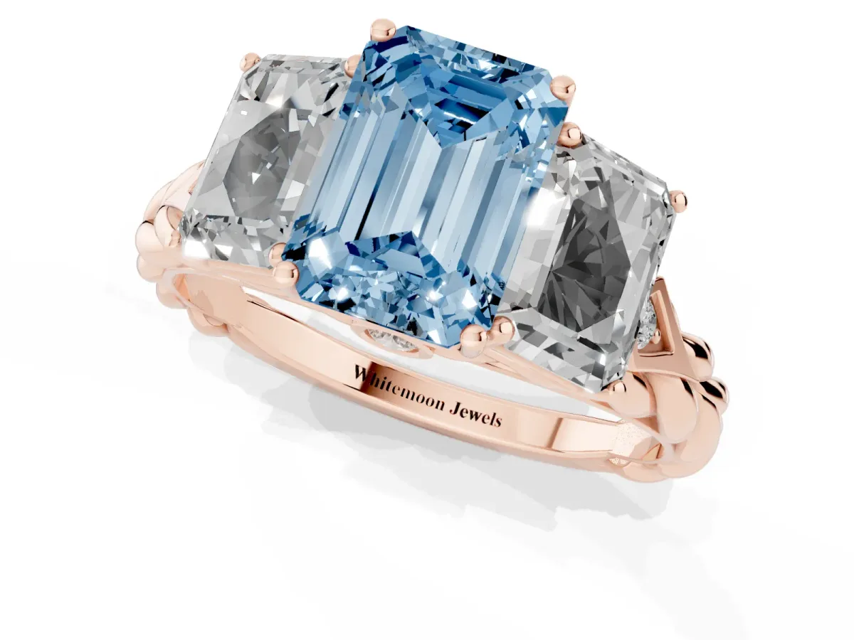 Fancy Blue Three-Stone Emerald Cut Diamond Braided Band Ring with Four-Prong Setting Rose gold