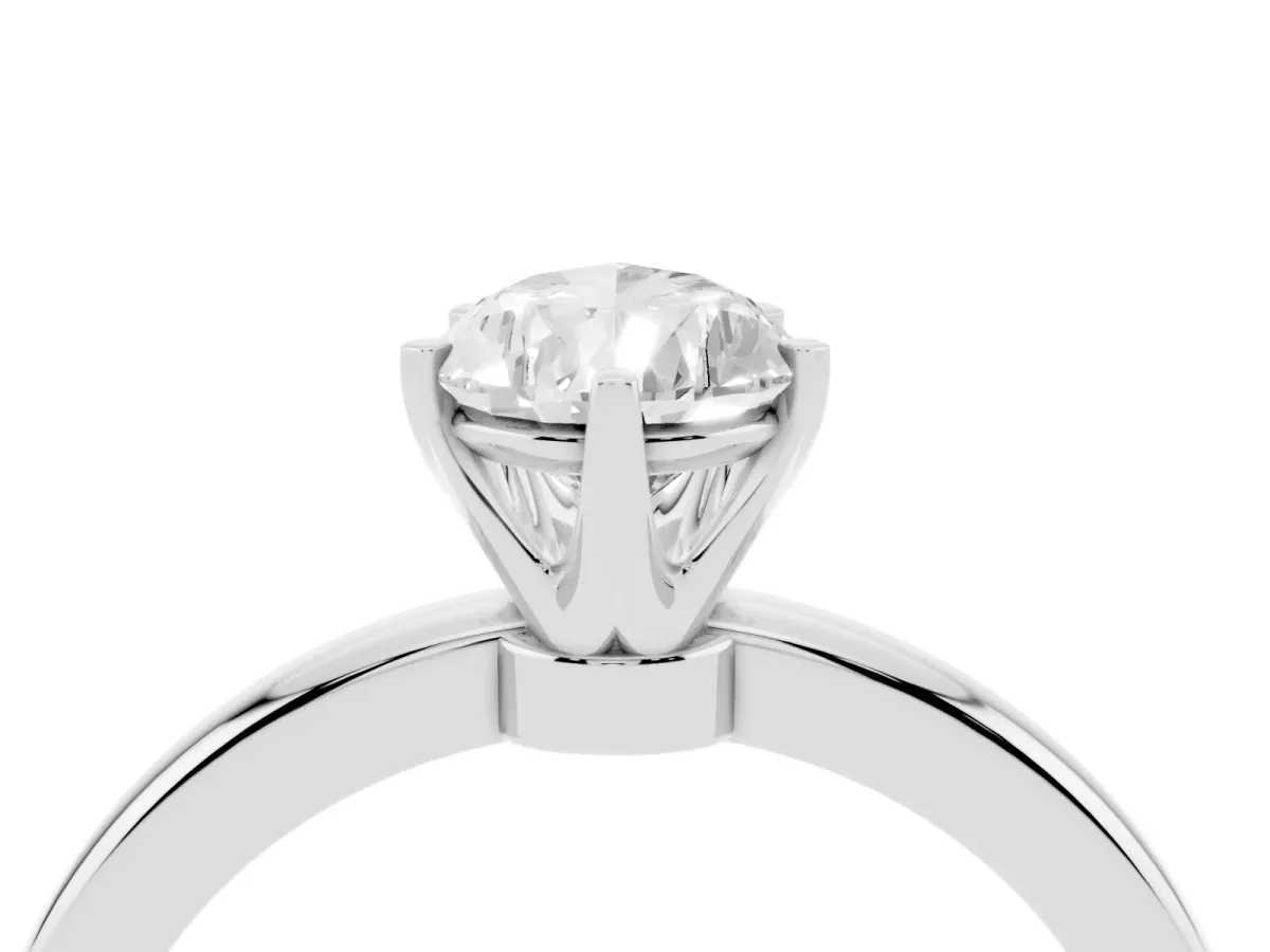 Pear Cut Solitaire Diamond Ring with Six-Prong Setting on a Classic Band Platinum