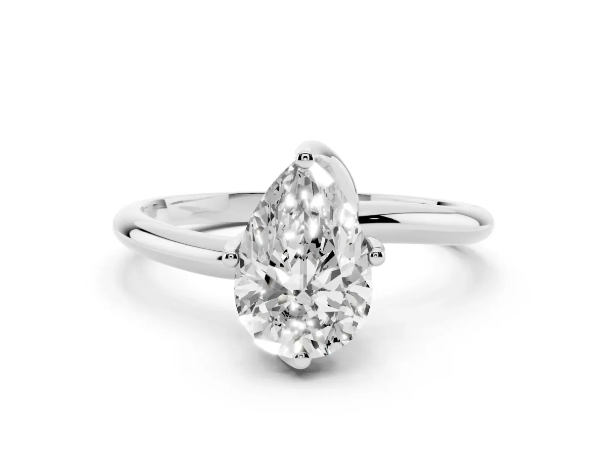 Pear Cut Diamond Solitaire Engagement Ring with Four-Prong Setting and Classic Band Silver