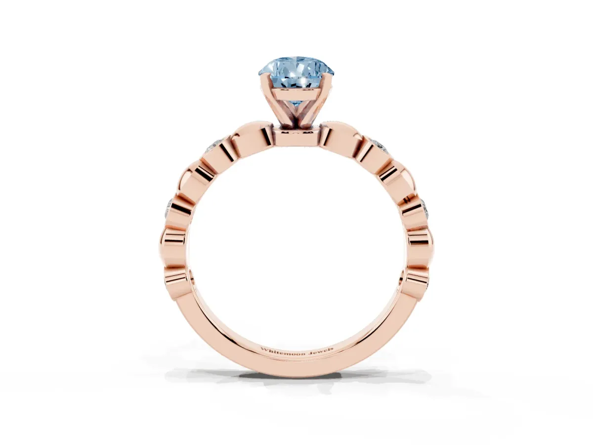 Fancy Blue Pear Cut Solitaire Bezel-Set Diamond Ring with Beaded Band and Four-Prong Setting Rose gold