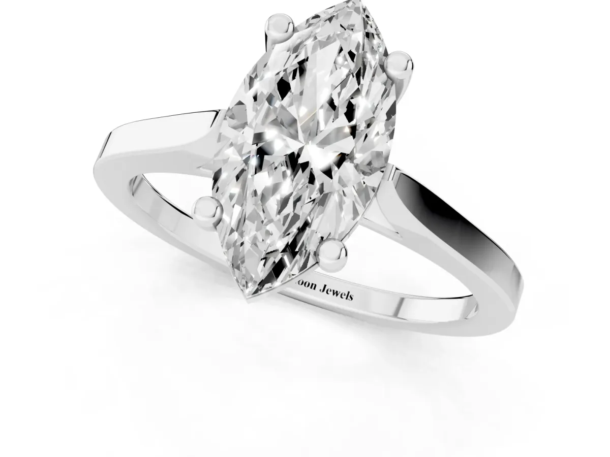 Marquise Cut Solitaire Diamond Ring with Four-Prong Setting and Tapered Band Platinum
