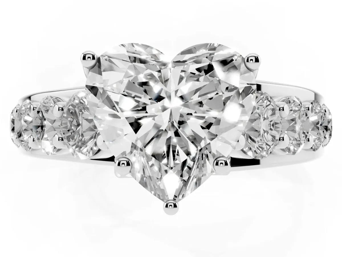 Heart Cut Diamond Engagement Ring with Pavé Band and Four-Prong Setting Silver