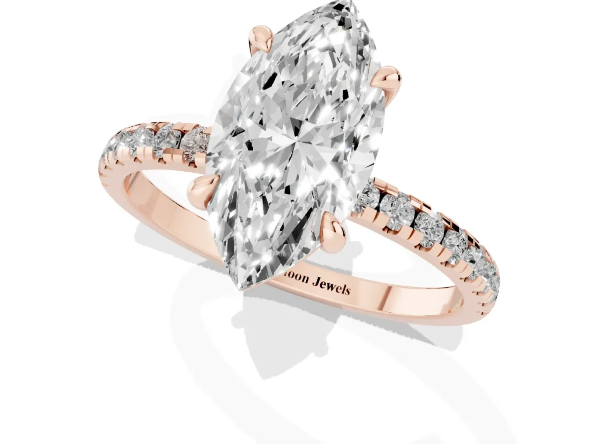 Marquise Cut Diamond Brilliant Solitaire Ring with Pavé Band and Four-Prong Setting Rose gold