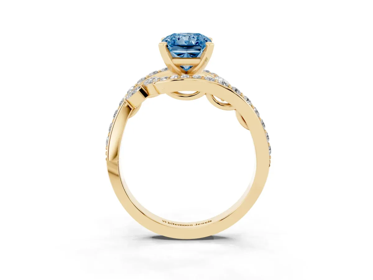 Fancy Blue Radiant Cut Solitaire with Pavé Twist Band and Four-Prong Setting Yellow gold