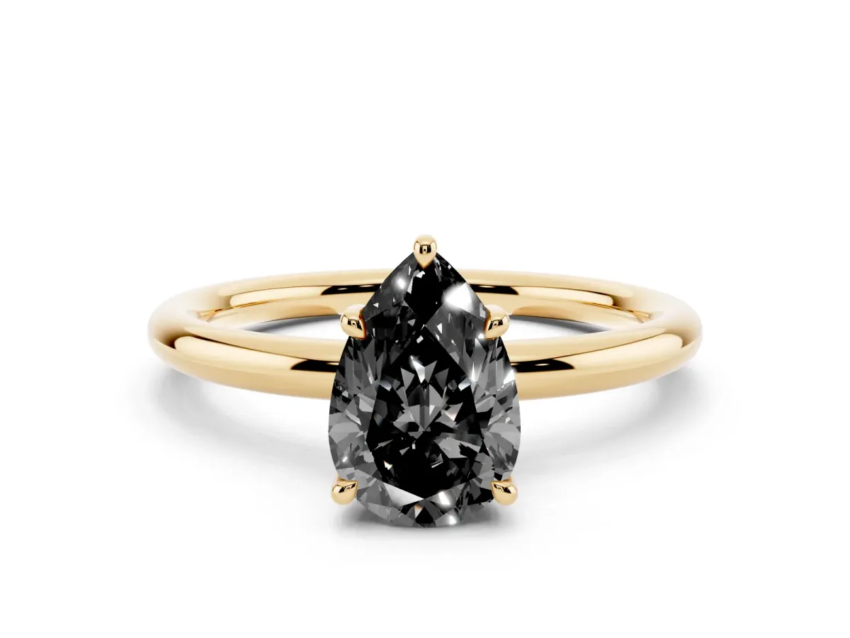 Fancy Black Pear Cut Diamond Solitaire Ring with Thin Band and Four-Prong Setting Yellow gold