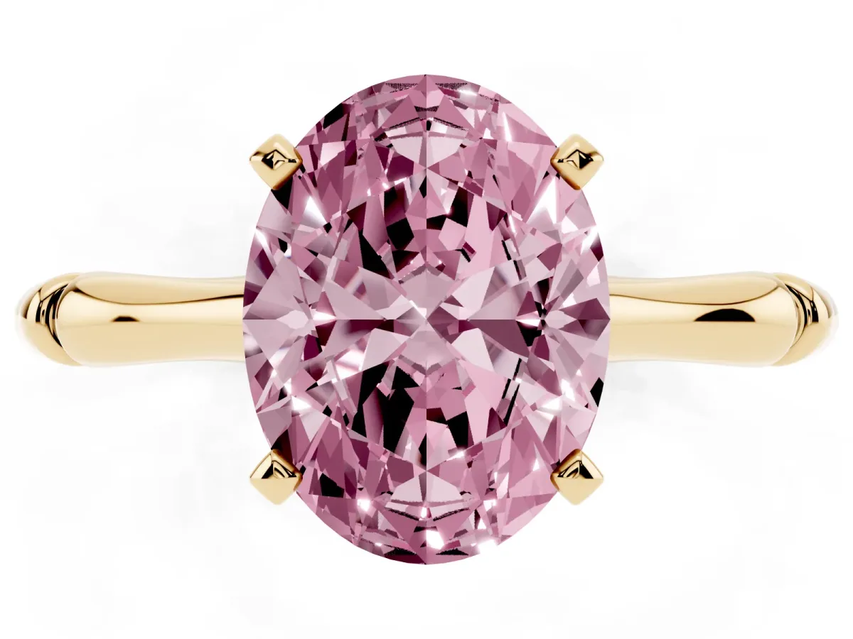 Fancy Pink Oval Cut Solitaire Diamond Ring with Bamboo Band and Four-Prong Setting Yellow gold