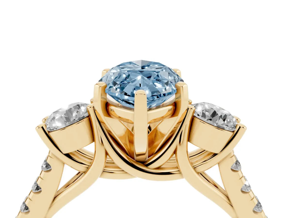 Fancy Blue Three-Stone Marquise Cut Diamond Pavé Band with Four-Prong Setting Yellow gold