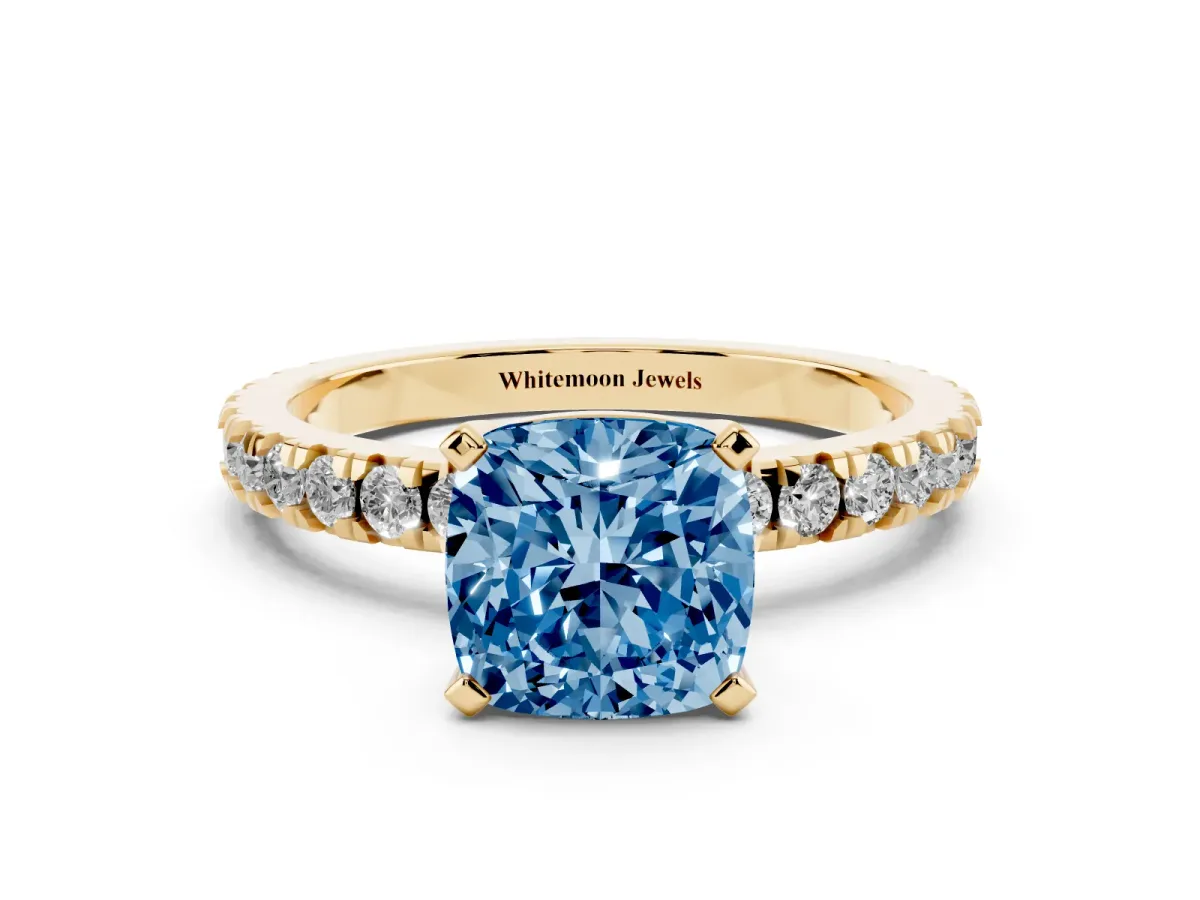 Fancy Blue Cushion Cut Diamond Pavé Band Solitaire with Four-Prong Setting Yellow gold