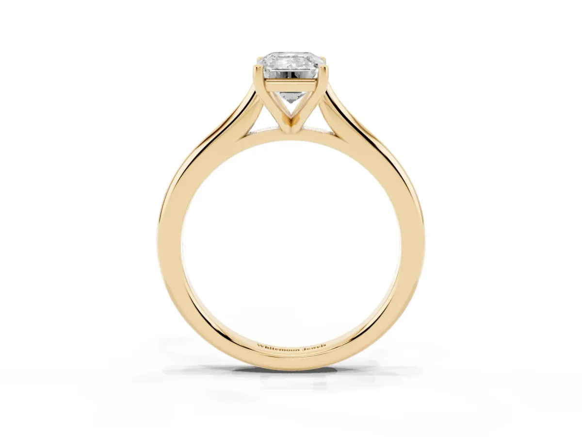 Emerald Cut Cut Solitaire Ring with Cathedral Band and Four-Prong Setting Yellow gold
